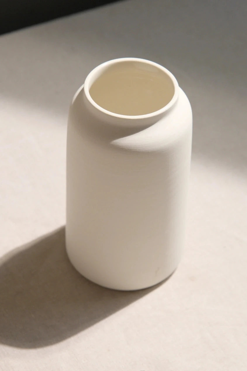 The L'Impatience medium ivory bouquet vase viewed from above side looking slightly in.