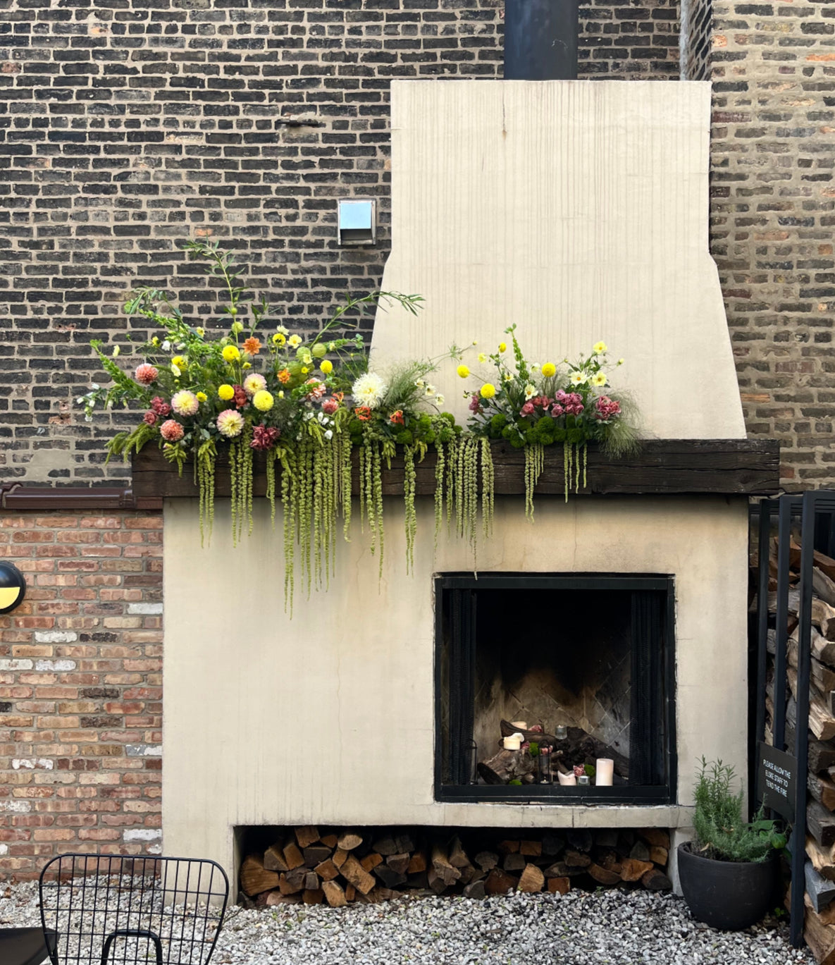Floral installation by Sprout-home on the fireplace outside at Elske Restaurant in Chicago. Photo by Sprout-home