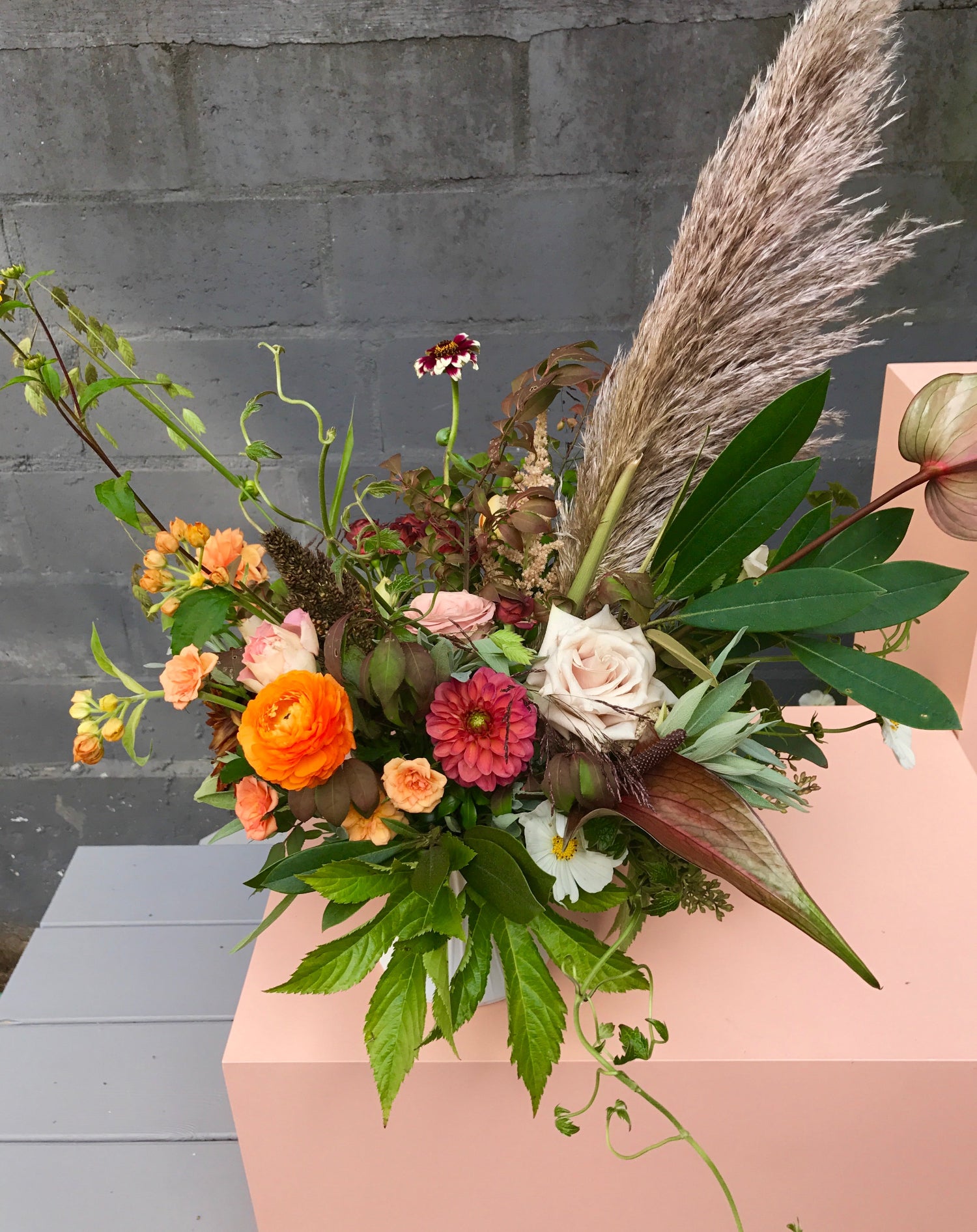 A fun fall arrangement featuring a pampas bloom by Sprout-home. Photo by Sprout-home.