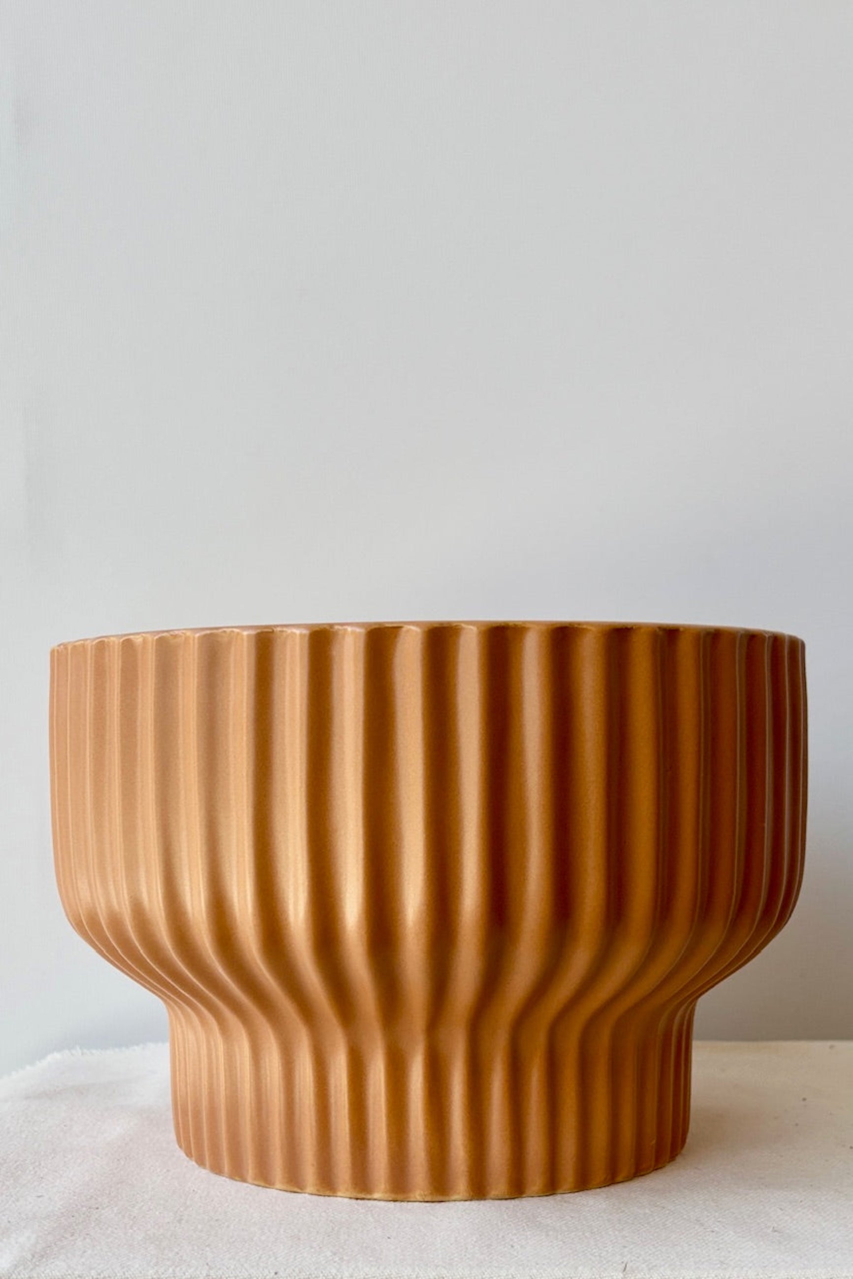 Large Ginger planter by Jungle Club displayed against a white wall