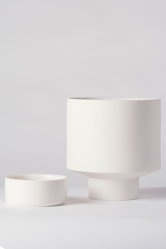 white Collector's Gro pot by Angus & Celeste shown with its saucer to the side of the pot