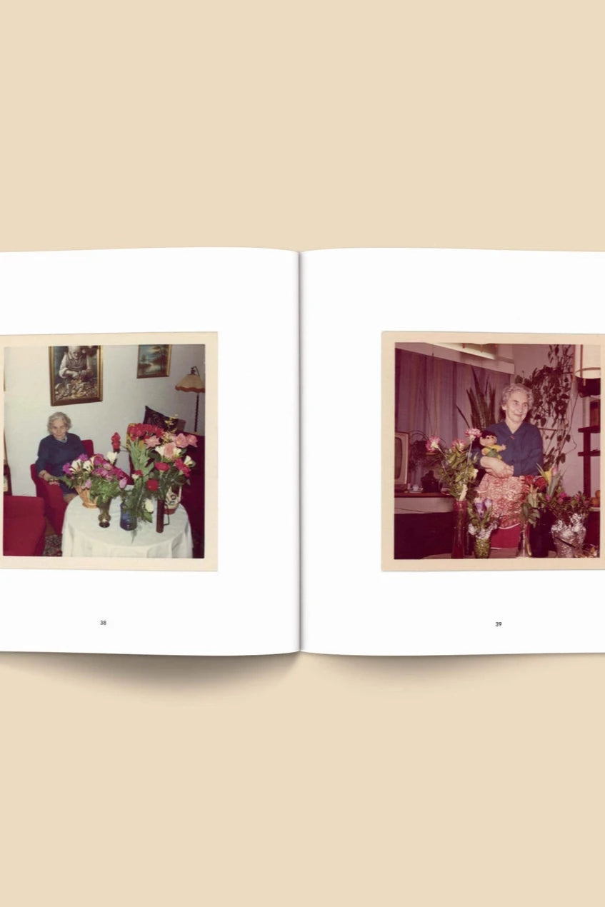 Forgotten Flowers Coffee Table Book by Broccoli  open to pages with vintage photos