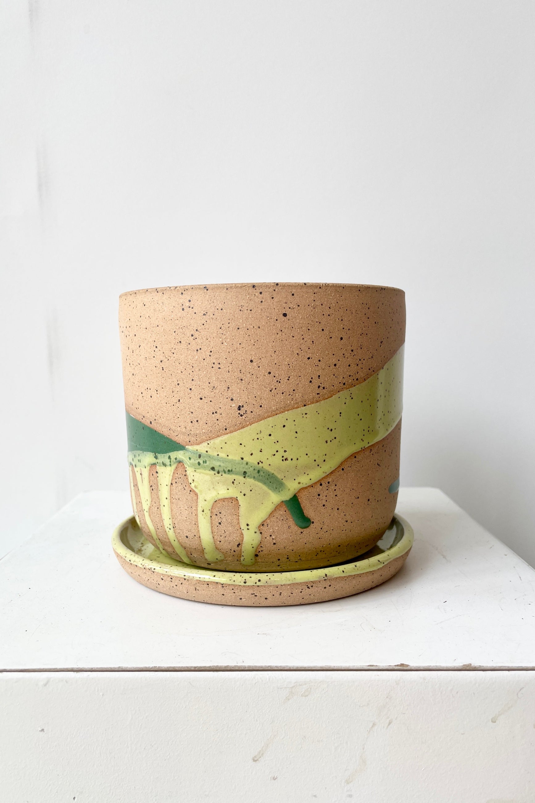 The Green Splash Cylinder pot and saucer handmade by Christina Kosinski at Sprout-home