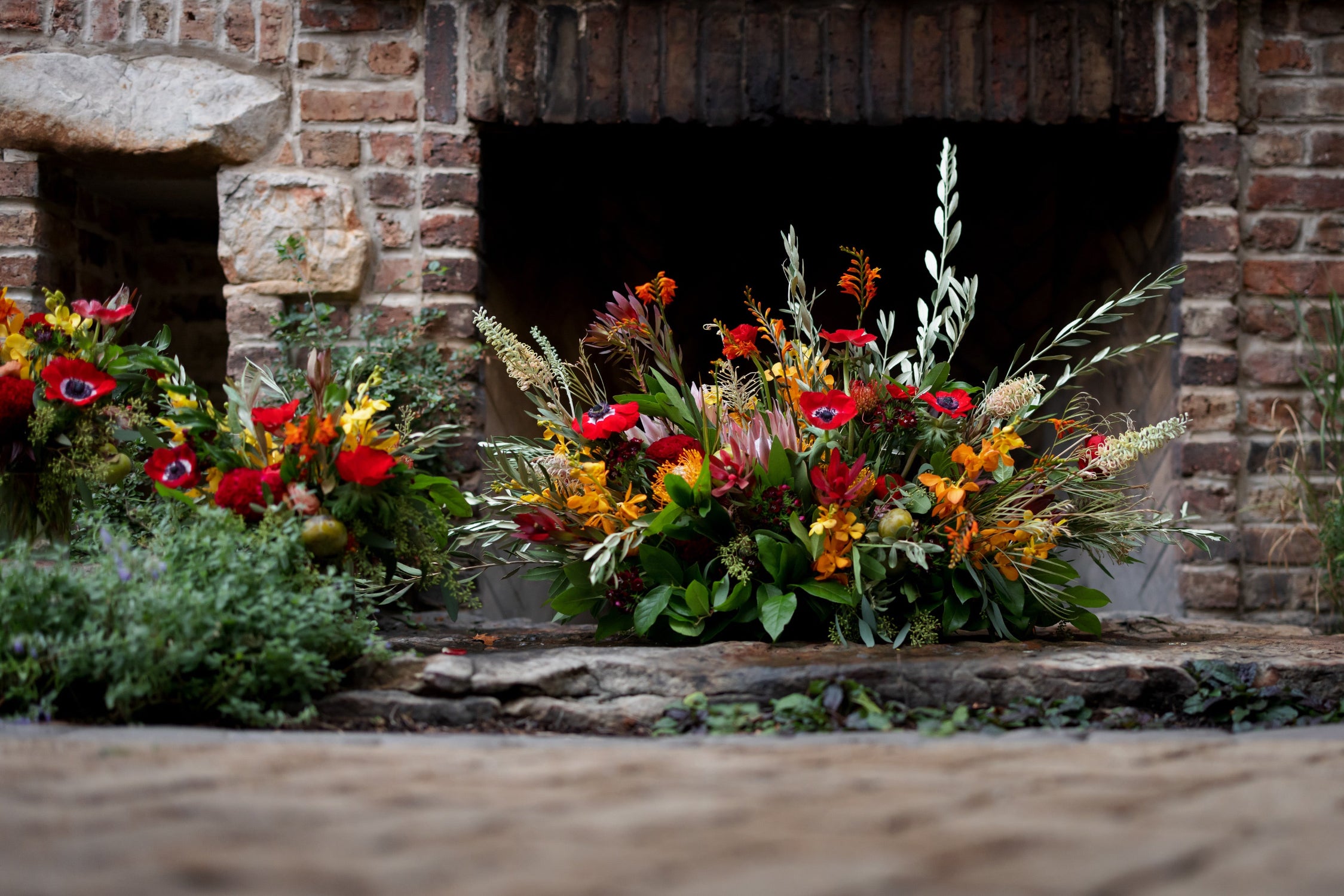 Nabulsi wedding at the Dawson in Chicago. Red and warm floral floral pieces by Sprout-home. Photo by Wasabi Photography