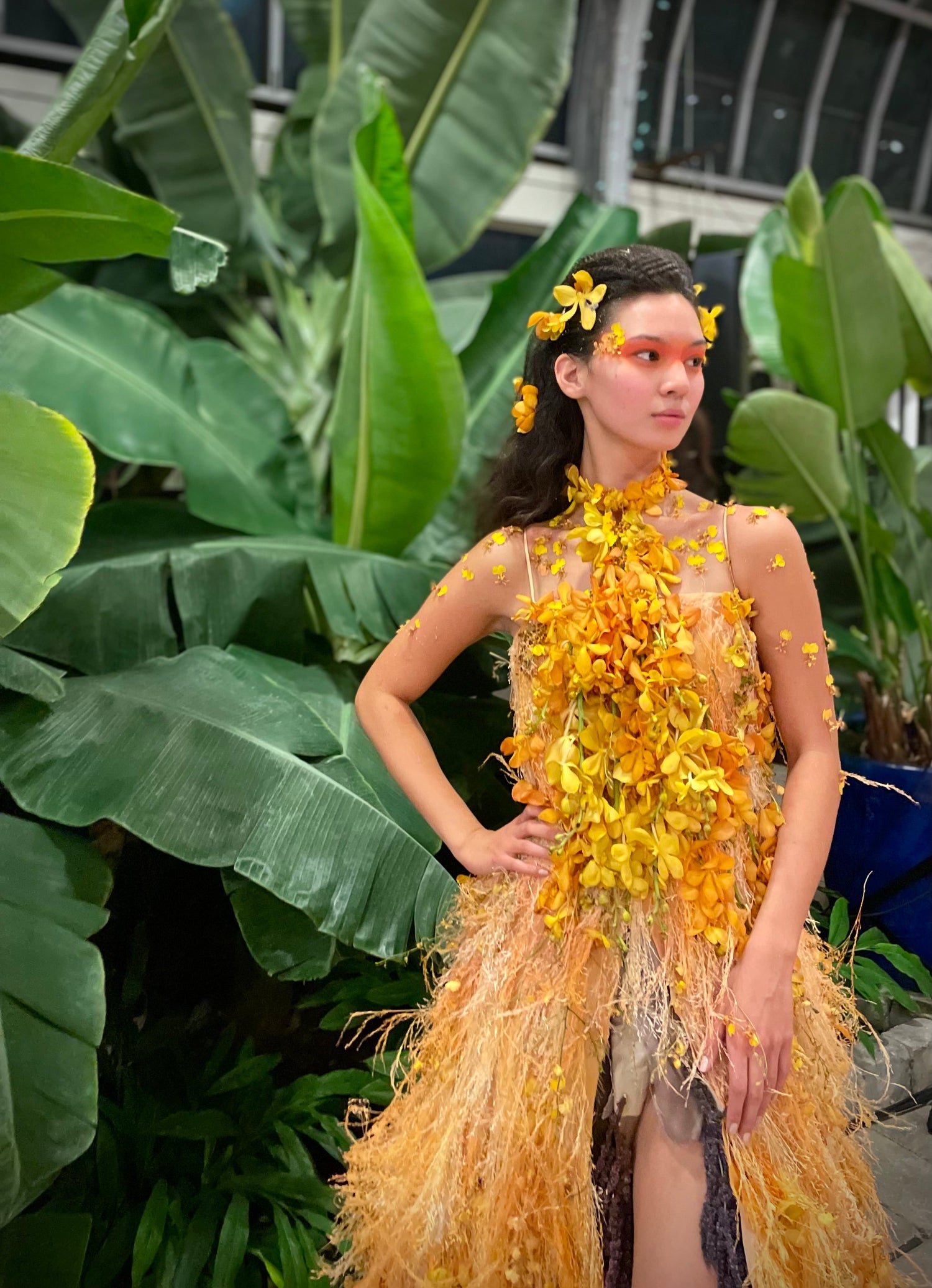 Fleurotica event at the Garfield Park. Yellow dress floral creation by Sprout-home. Made with orchids and dried papas and Ava grass. Photograph by Sprout-home. 