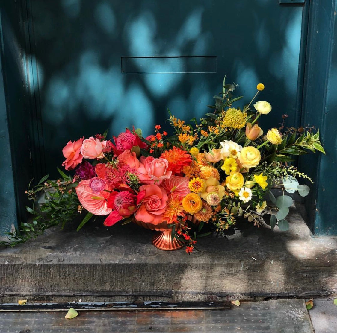 A bright and fun Gradient floral arrangement by Sprout-home. Photo by Sprout-home. 