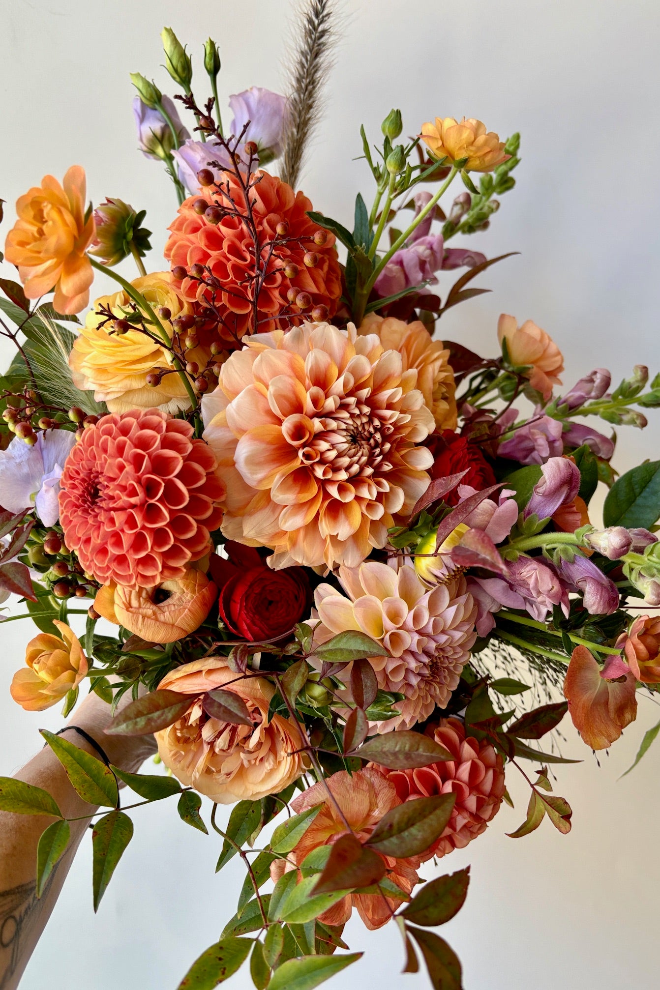 a bundle of floral comprises of dahlia and ranunculus at Sprout-home