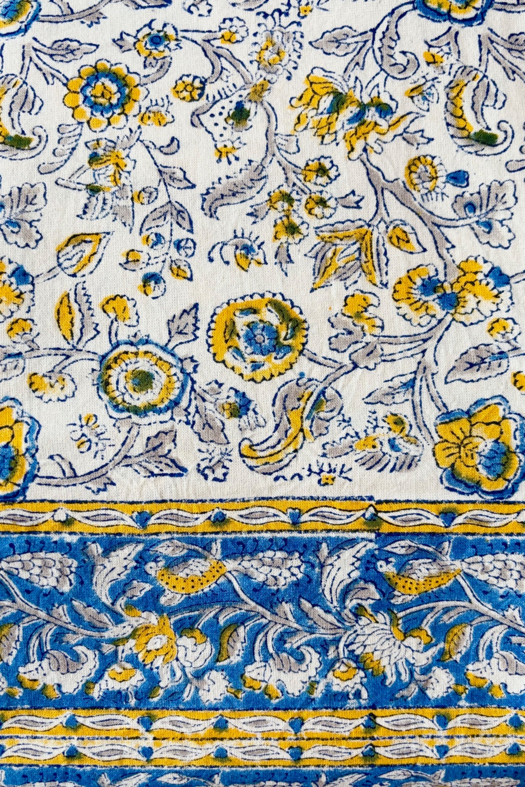 100% cotton hand block printed tablecloth with blue and yellow floral motif 