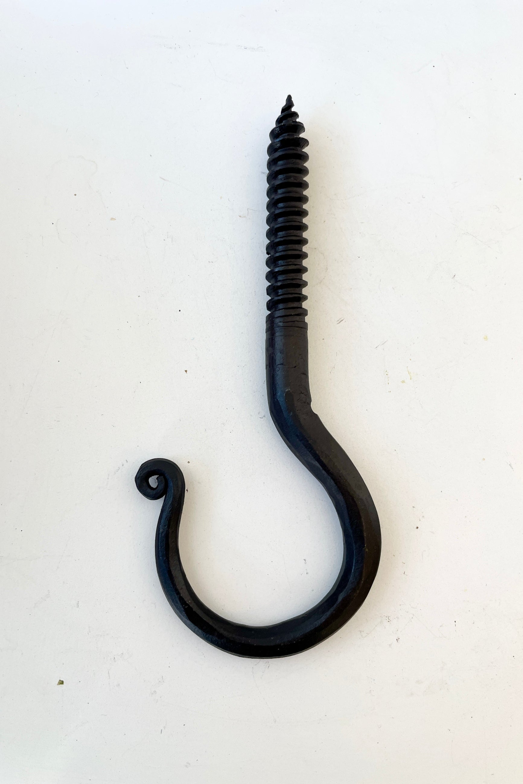 A threaded blacksmiths hook at Sprout-home being shown from the side. 