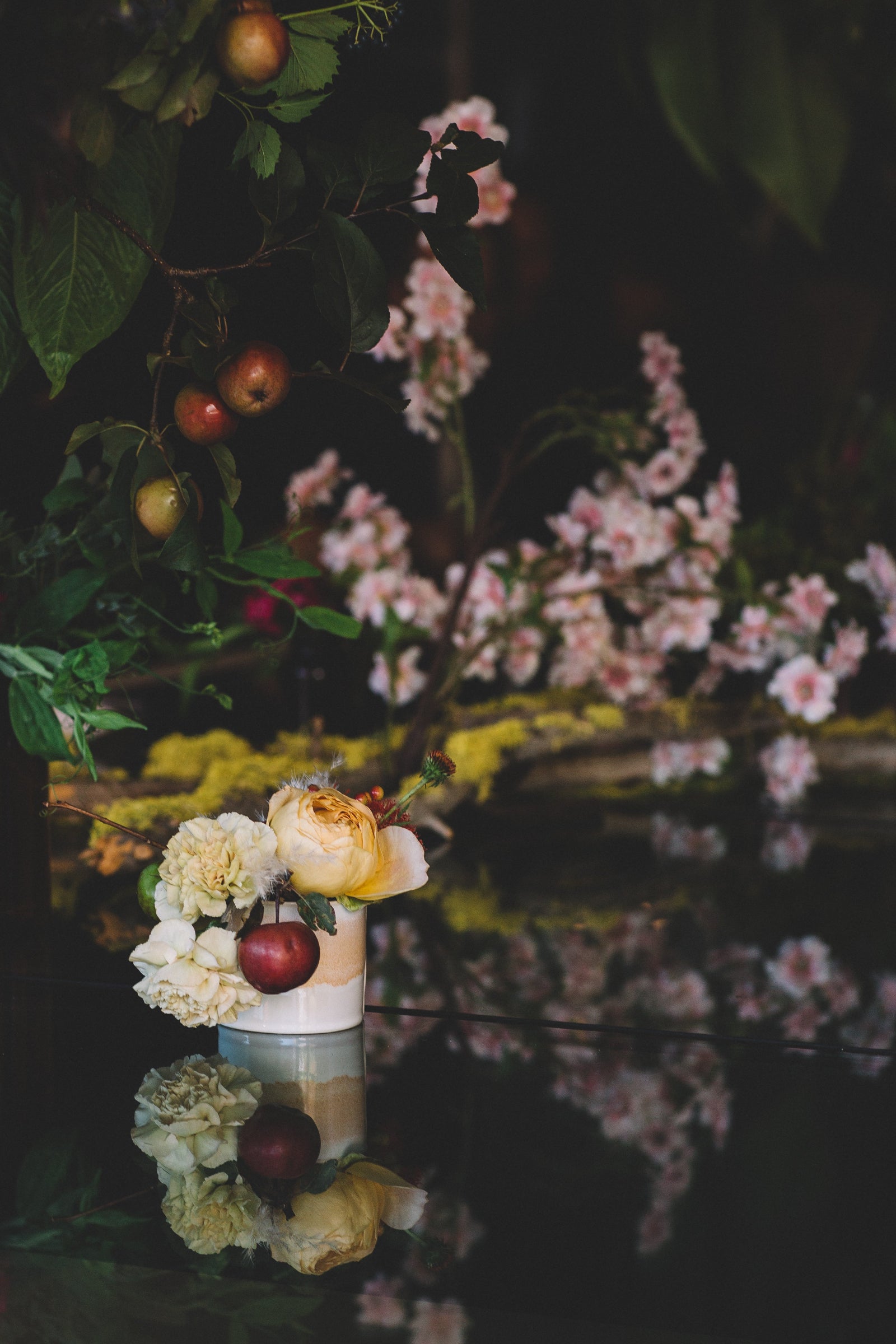 Sprout-home Floral small arrangement with floral branch backdrop. Photographed by Stephanie Bassos