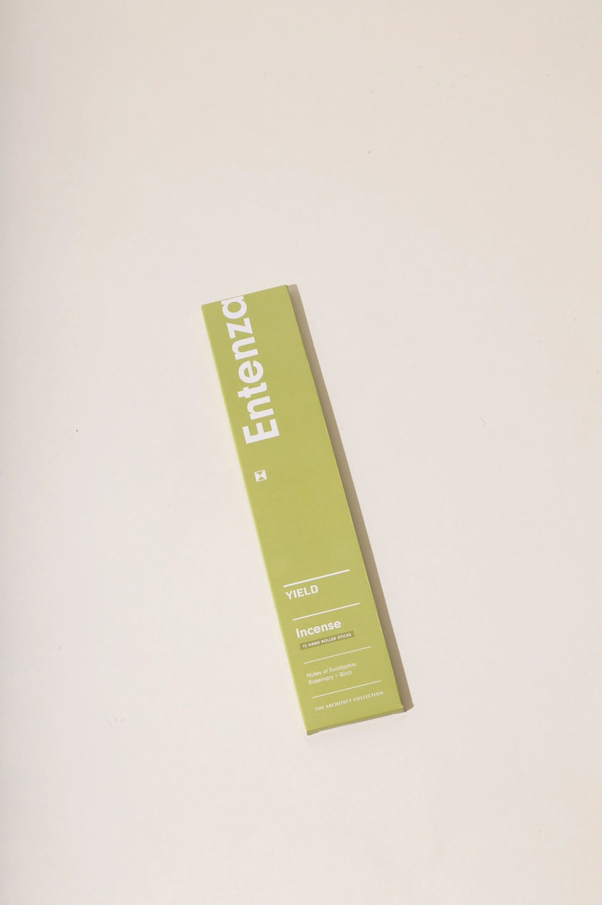 Entente Stick Incense by Yield in its green packaging.