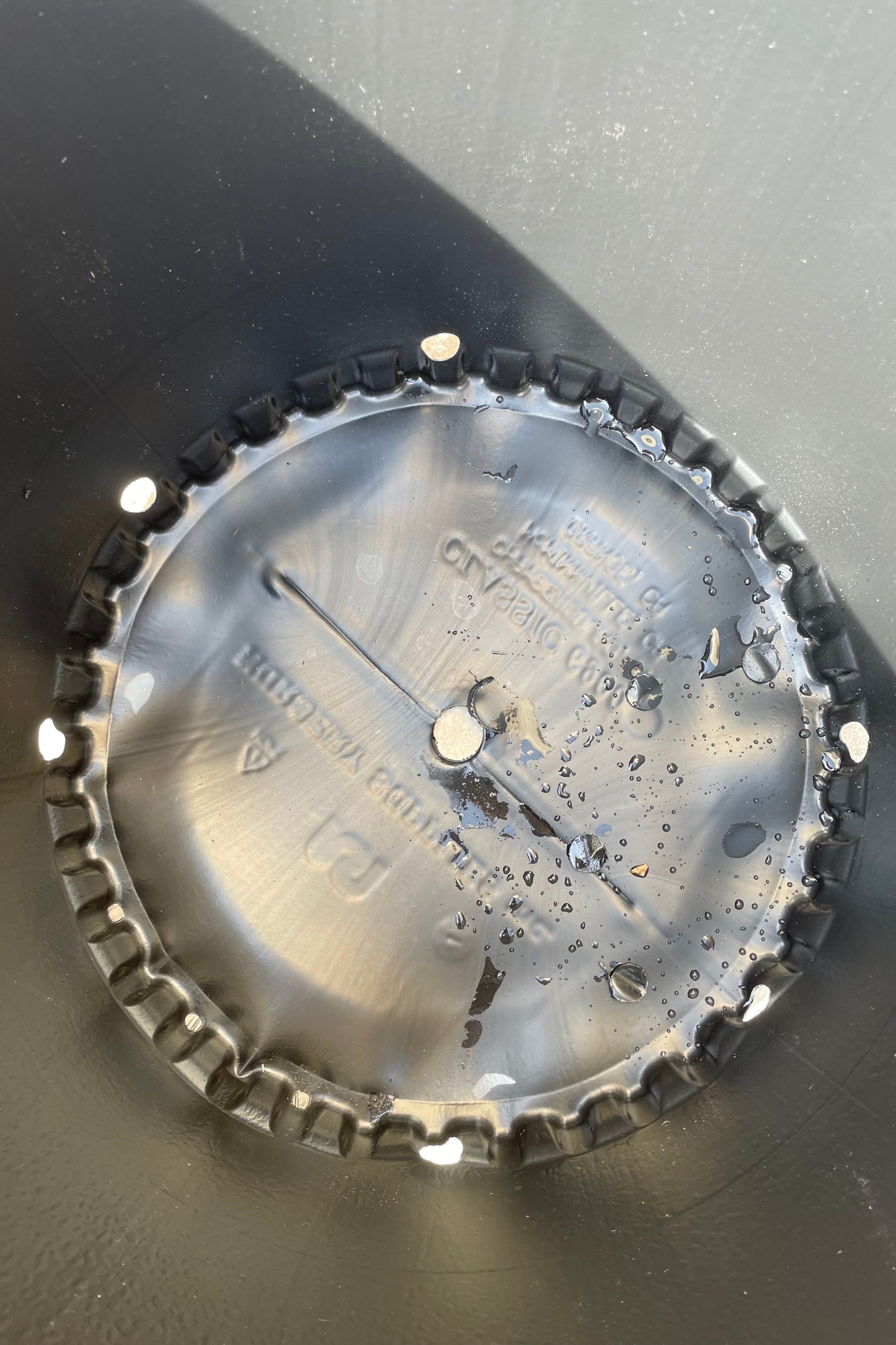 the interior of an 18" growers pot showing the drain holes.